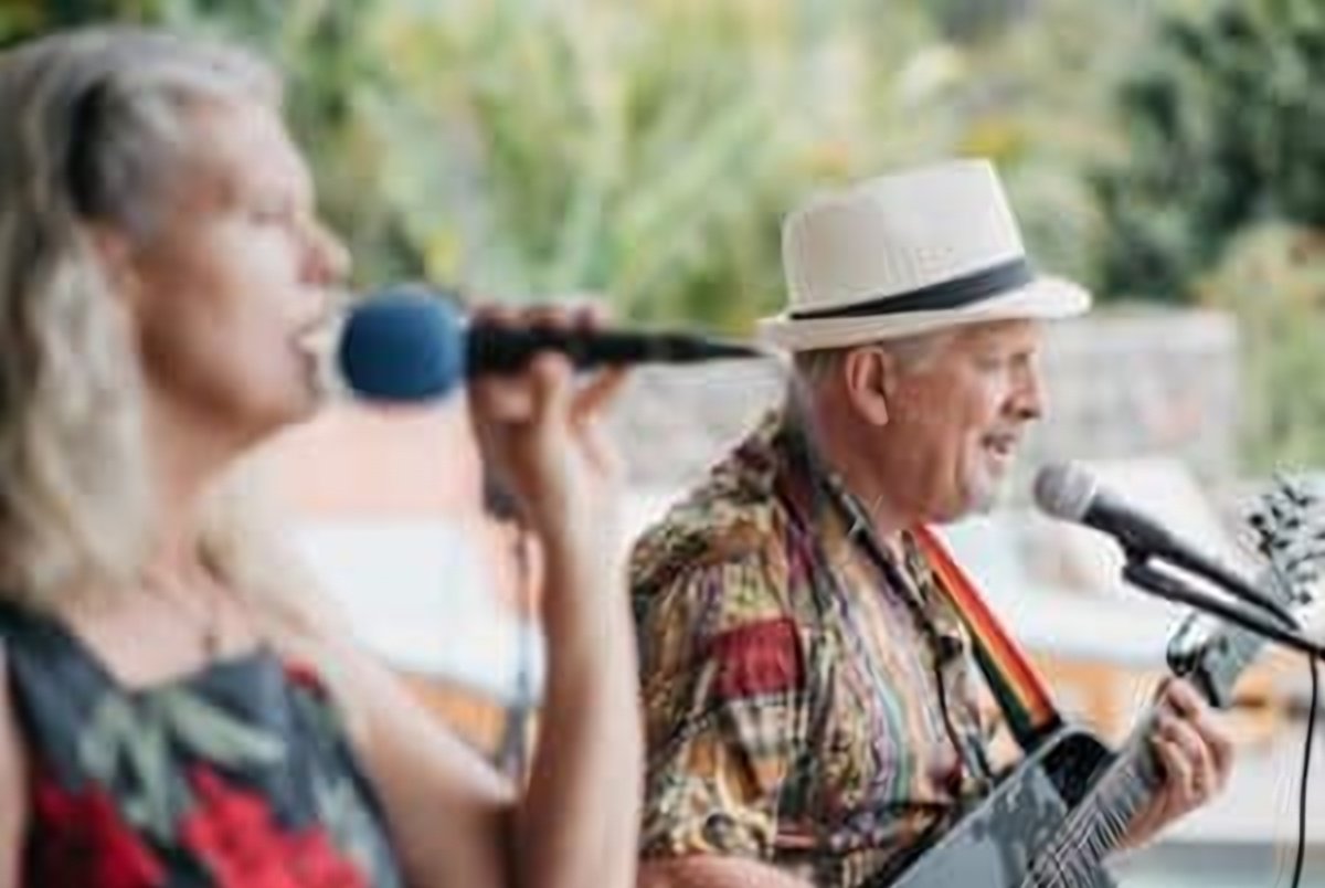 Mark and Traci performing together at a Lake Atitlán wedding